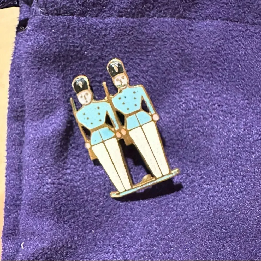 Vintage enamel on gold tone metal soldiers pin brooch